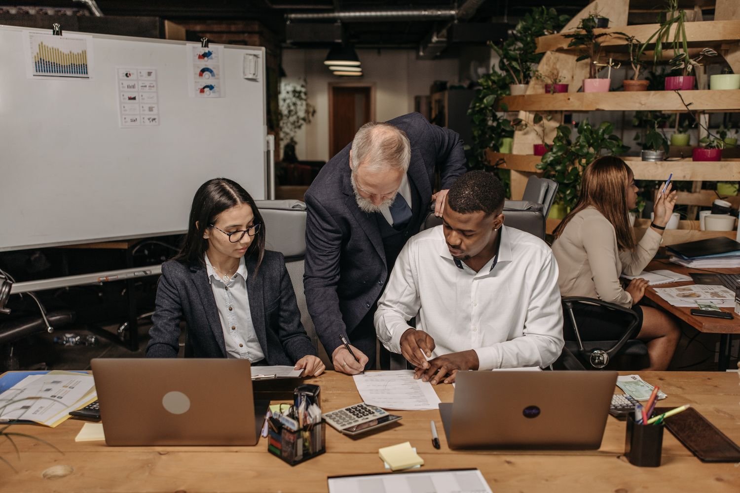 Colleagues working together on a laptop